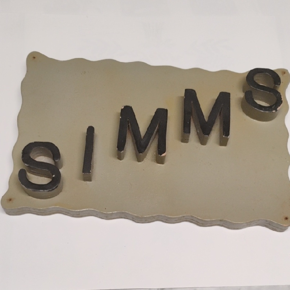 Simm's Beige and Black Wall Plaque by
